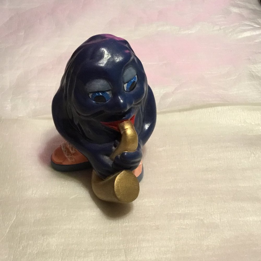 Vintage hand-painted California Raisin ceramic figure playing golden Saxaphone